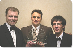 Joomla awards: Best Linux / Open Source Project au UK Linux and Open Source Awards 2005, à Londres -Andrew Eddie, Alex Kempkens and Brian Teeman